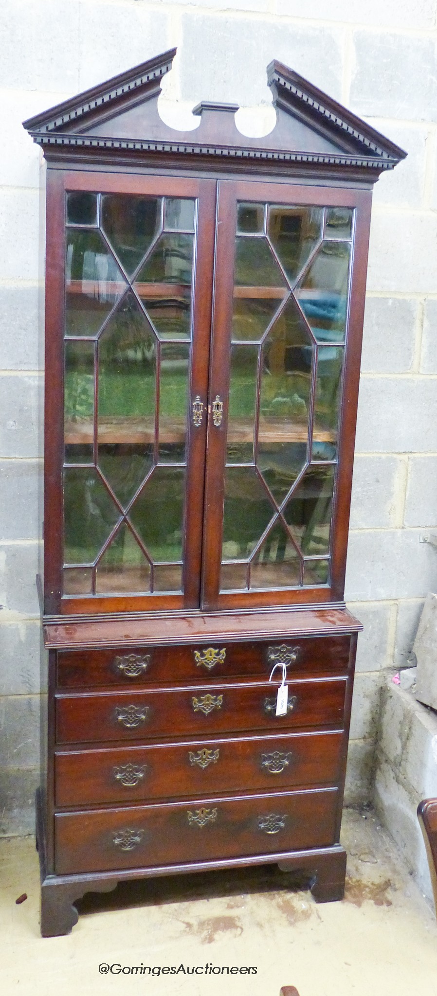 A George III style mahogany bookcase/gun cabinet